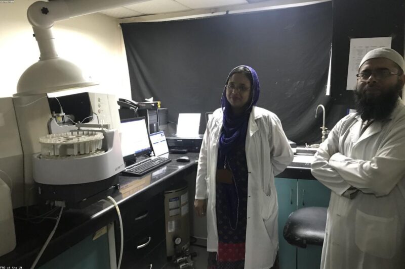 AI agents monitoring food safety in a modern laboratory setting